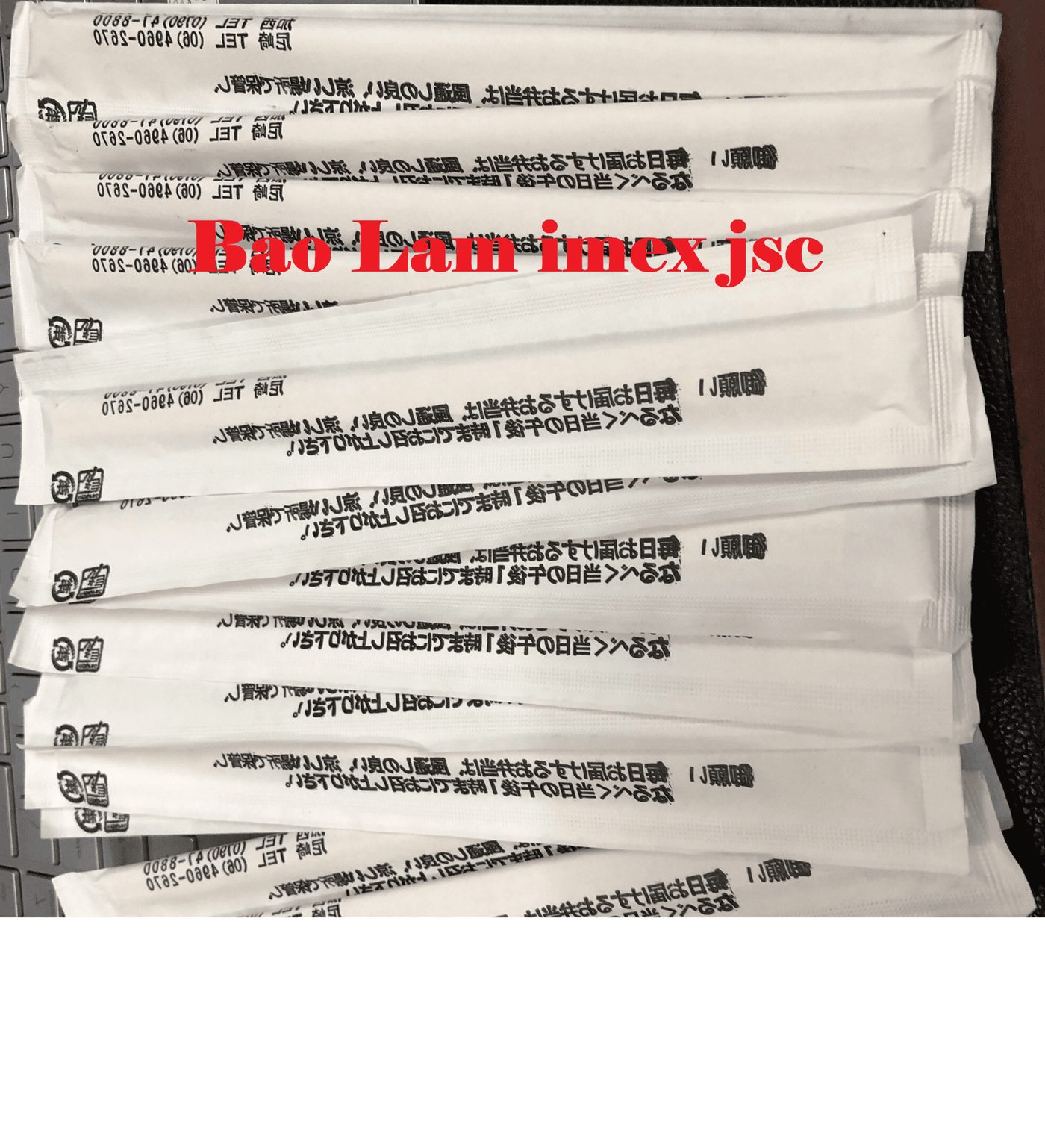 Disposable wooden chopsticks in fully sealed paper packaging with custom logo printing